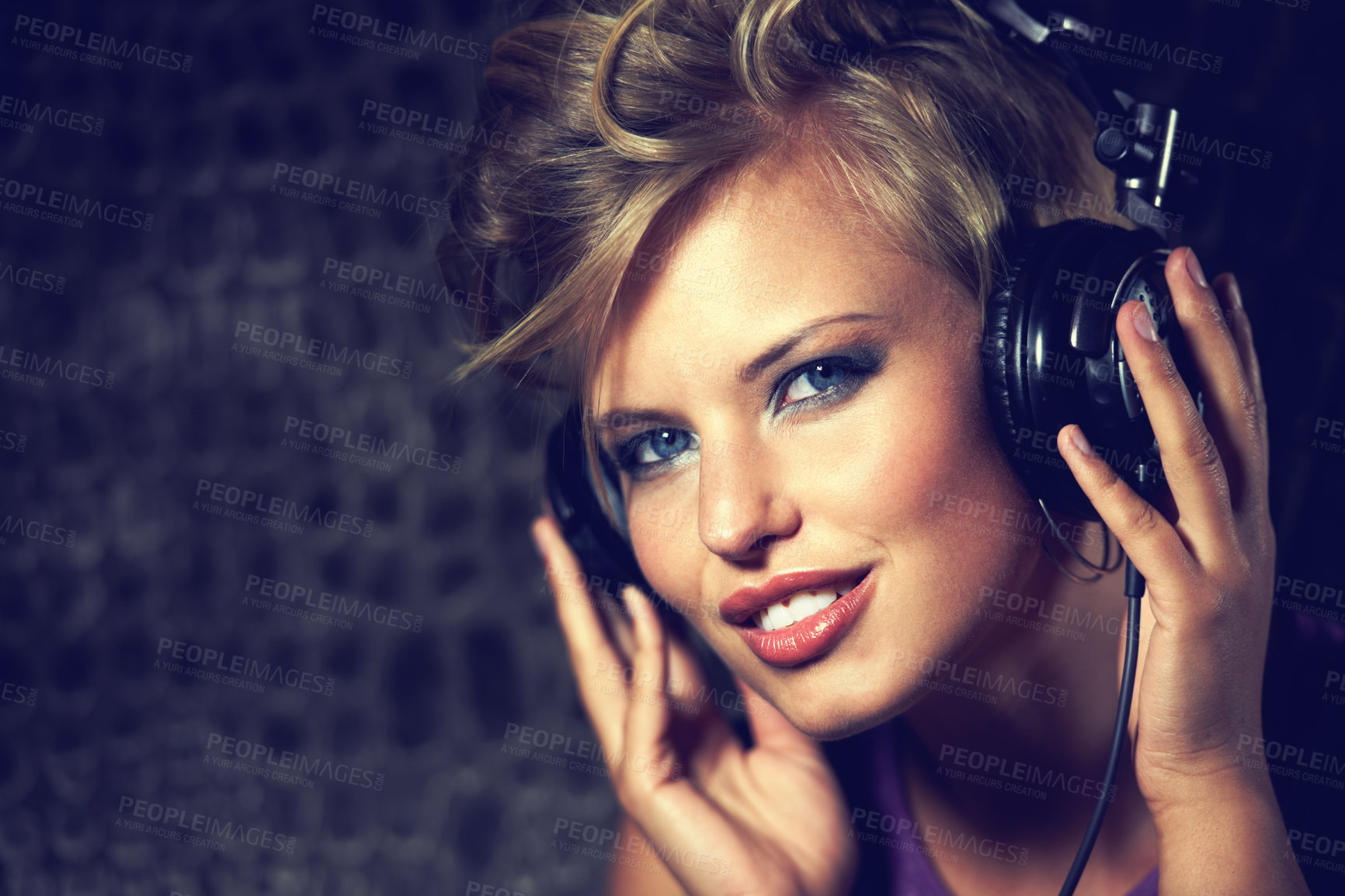 Buy stock photo Happy, portrait and woman with headphones for music, streaming and listening to radio in dark. Techno, sound and face of musician mixing track and relax with trippy audio for entertainment in home