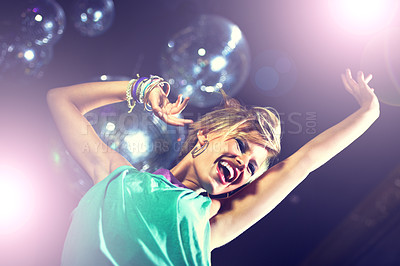Buy stock photo Happy, woman and dance at club with disco, music and movement with energy at party. Girl, smile and enjoy rave culture at techno, nightclub and person moving to sound or audio at event from low angle