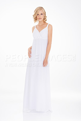 Buy stock photo Studio shot an attractive young woman in white dress