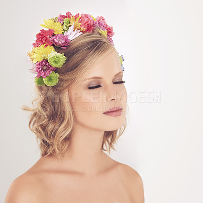 Buy stock photo Woman, makeup and flowers on crown in studio with face and confidence for cosmetics, beauty and skincare. Spring aesthetic, model and floral headband with mockup space or wellness on white background
