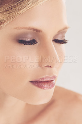 Buy stock photo Cropped shot of a beautiful young woman in the studio