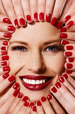 Buy stock photo Beauty, cosmetics and portrait of woman with manicure, smile and lipstick with creative aesthetic. Luxury makeup, face and hands with red nail polish for self care, shine and happy model with product