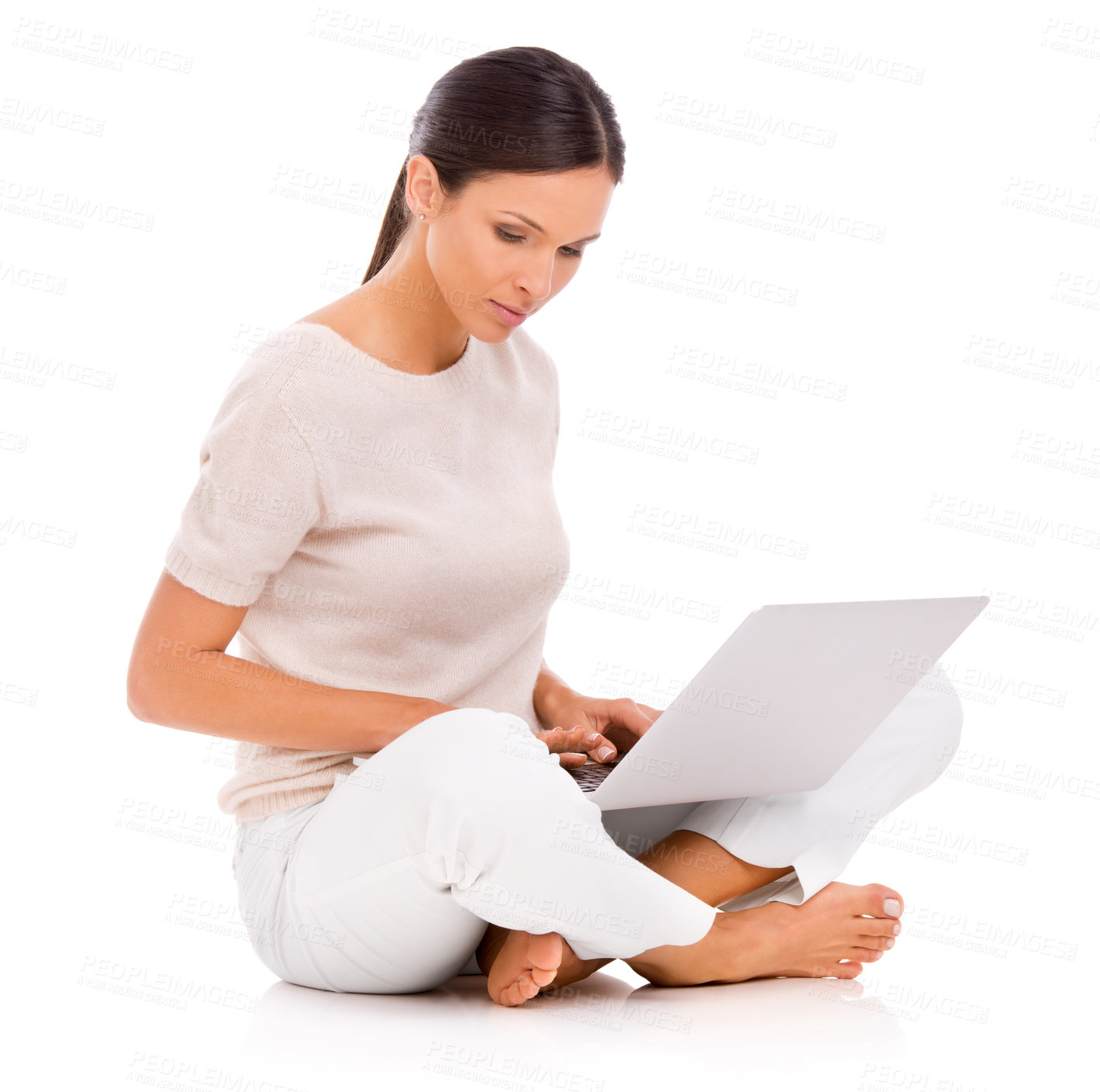 Buy stock photo Laptop, research and serious with woman reading in studio isolated on white background for networking. Computer, learning or information with confident young person on floor for internet study