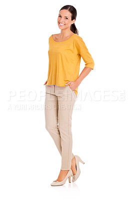Buy stock photo A casually dressed young woman standing with her hands in her pockets