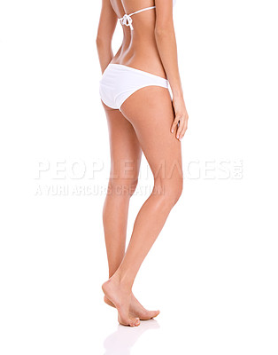 Buy stock photo Legs, woman in underwear and hair removal for skincare, beauty and grooming isolated on white background. Epilation, smooth skin and wellness with cosmetics and shine from waxing or laser in studio