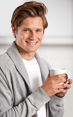 Buy stock photo Smile, portrait and man with cup of coffee in kitchen of home for relax, health and wellness. Happy, confident and young male person drinking cappuccino, espresso or latte in modern apartment.