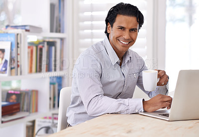 Buy stock photo Cropped side of a handsome businessman working from home
