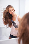 Taking care of her luscious mane
