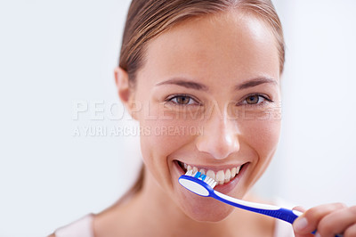 Buy stock photo Woman, portrait and brushing teeth in bathroom with smile, health and self care for oral hygiene, wellness and routine. Girl, toothbrush and happiness for cleaning, healthy mouth and start morning
