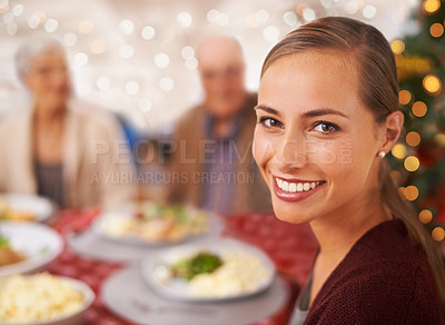 Buy stock photo A family sitting around the table at Christmas