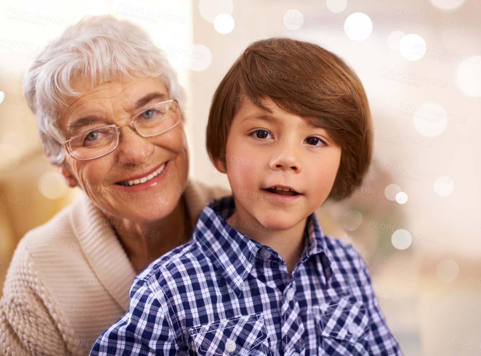 Buy stock photo Portrait, grandmother and Christmas with a boy, child and festive season with hug and family. Face, embrace and elderly woman with kid and Xmas with lights and home with love, relax and celebration