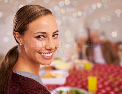 Buy stock photo Portrait, Christmas and woman with her family, meal and relaxing with festive season and healthy dinner. Face, girl or people with social gathering or home with smile or Xmas with holiday food or joy