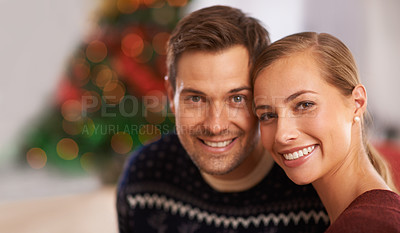 Buy stock photo Portrait, Christmas and couple with holiday, hug and party with romance and home with lights. Face, apartment and man with woman and celebration with embrace and festive season with marriage and Xmas