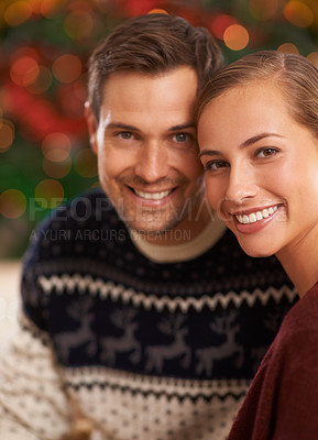 Buy stock photo Portrait, Christmas and couple with holiday, romance and party with celebration and home with lights. Face, apartment and man with woman or peace with holiday and festive season with marriage or Xmas