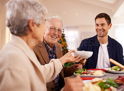Buy stock photo Senior, father and happy with family at Christmas dinner with food and reunion celebration in home. Holiday, event and man smile with lunch, roast dish and relax at dining room table with elderly