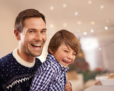 Buy stock photo Christmas, dad and portrait of funny child in home with bokeh, bonding and family having fun together at festive celebration. Xmas, face and kid with father laughing on holiday for love at party
