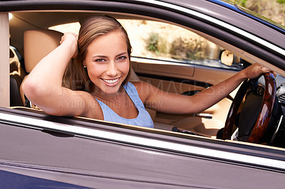 Buy stock photo A woman sitting in a luxury car