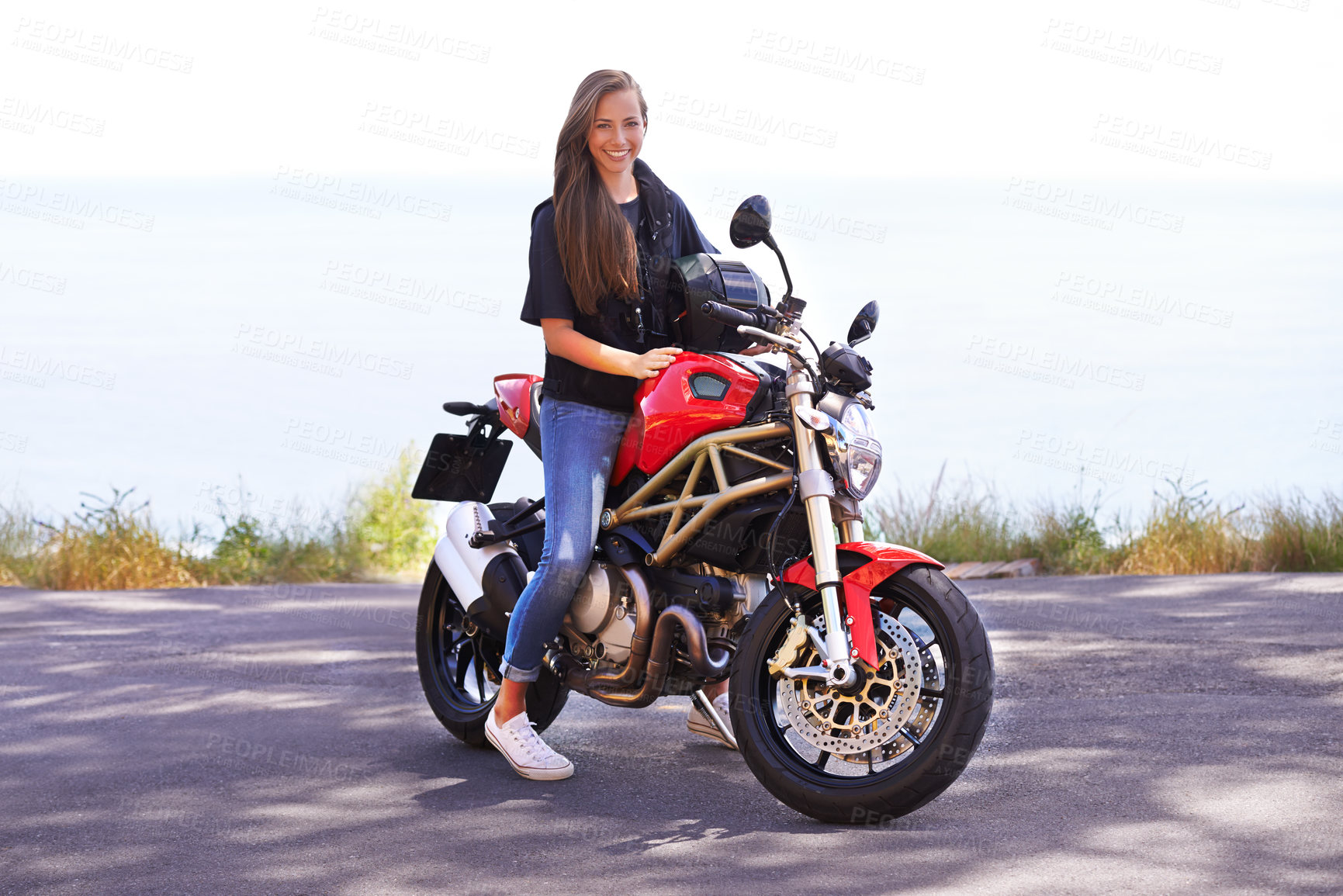 Buy stock photo Happy woman, rider and motorcycle by the ocean for road trip, travel or outdoor holiday in nature. Female person or biker with smile on hot ride or bike with helmet for transport on mockup space