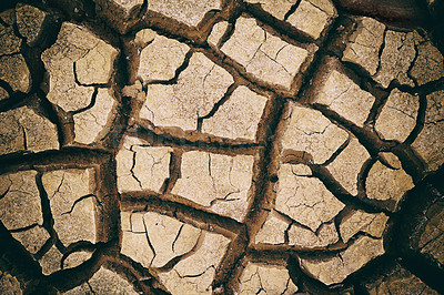 Buy stock photo Earth, dry and ground with cracks, nature and landscape with environment, dust and soil. Empty, barren and drought with extreme weather and climate change with ecology and water shortage with erosion