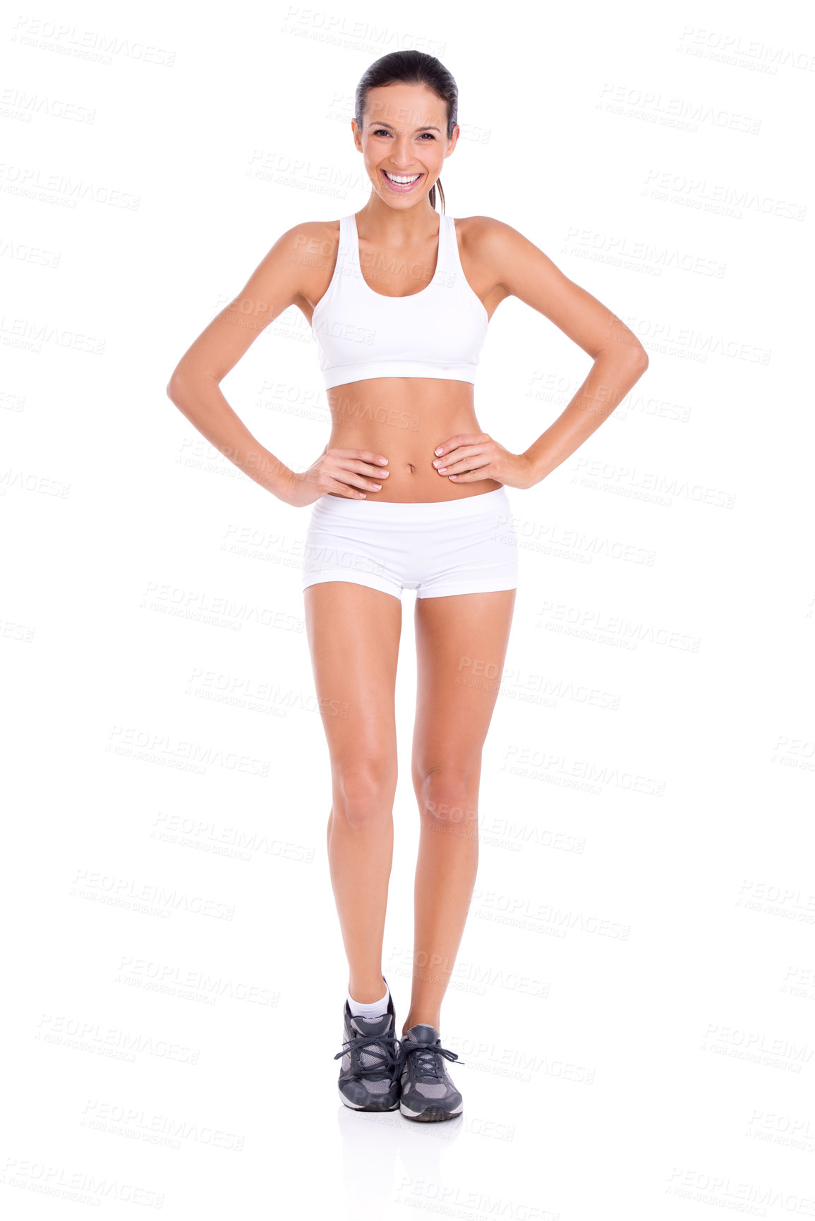 Buy stock photo Studio portrait of a fit young woman in exercise gear isolated on white