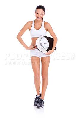 Buy stock photo Studio portrait of a fit young woman carrying a scale isolated on white