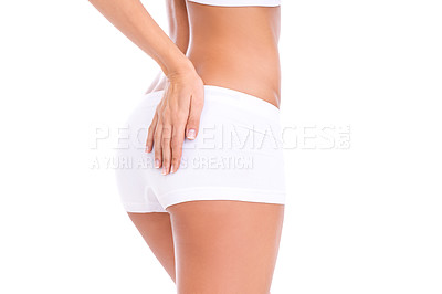 Buy stock photo Cropped studio shot of a woman's behind isolated on white