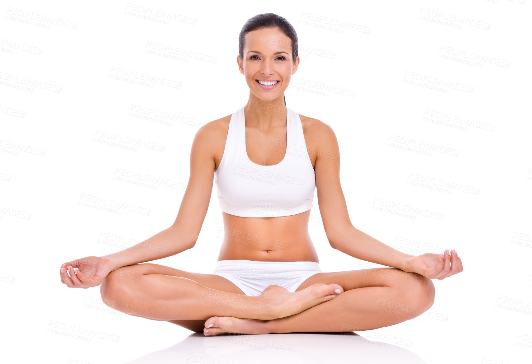 Buy stock photo Studio shot of a young woman in the lotus position isolated on white