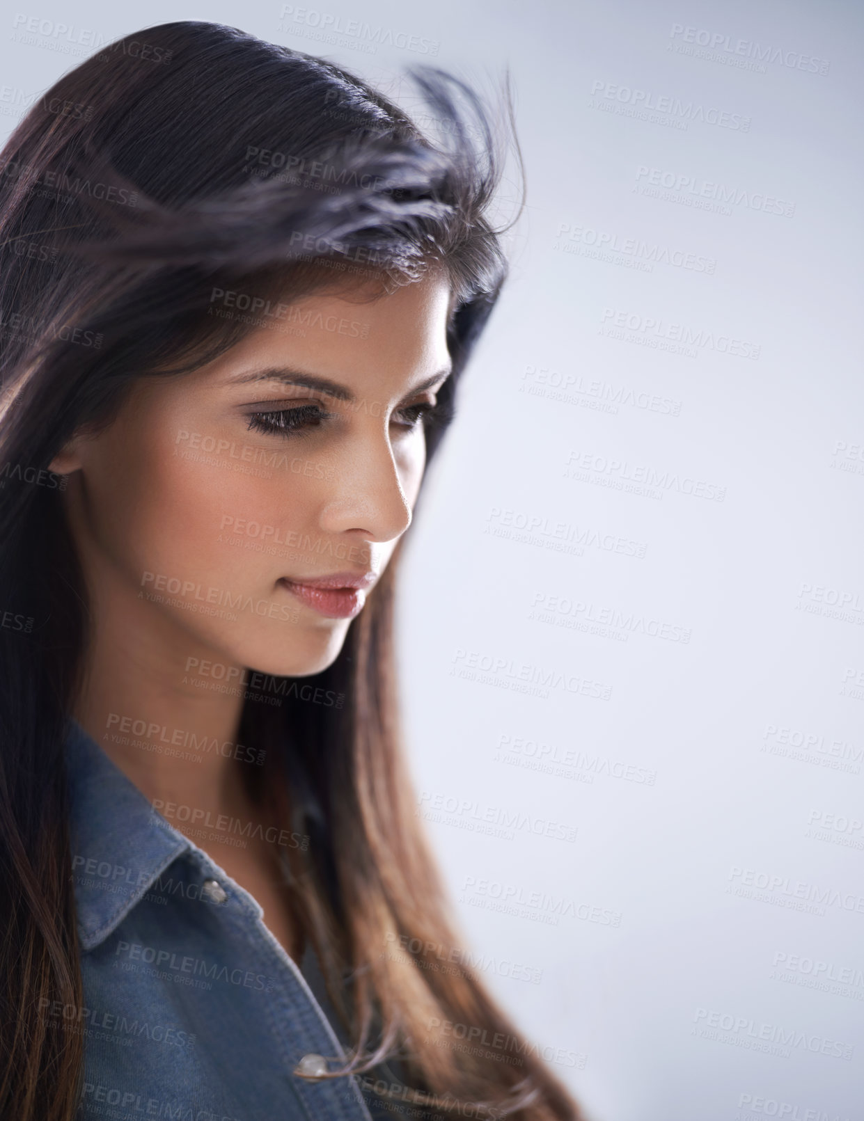 Buy stock photo Cropped shot a beautiful young woman with long brown hair