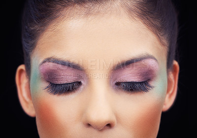 Buy stock photo Colorful, makeup and creative eyeshadow with woman in studio and black background with beauty. Cosmetics, creativity and model with unique rainbow aesthetic on face to glow or shine with confidence