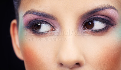 Buy stock photo Eyes, makeup and woman with colorful and creative beauty in studio and black background. Unique, cosmetics and model thinking with rainbow aesthetic on face to glow or shine with bold confidence