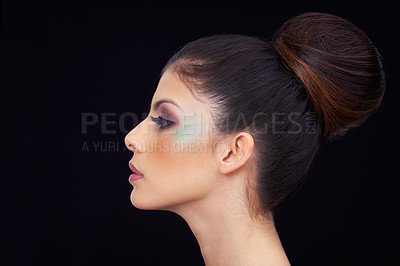 Buy stock photo Profile of a beautiful young woman against a black background