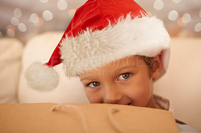 Buy stock photo Cropped portrait of a little boy on Christmas day