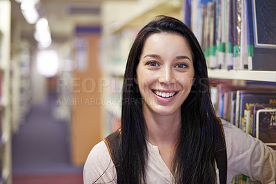 Buy stock photo Smile, student and portrait of woman in library for studying at university for test, exam or assignment. Happy, education and confident young female person by books at college campus or academy.