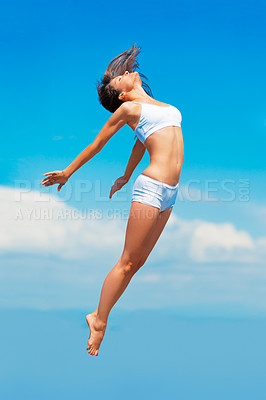 Buy stock photo Blue sky, jumping and woman in underwear with mockup for fitness, freedom and health goals. Mock up, energy and sports model with body jump, sunshine and healthy mindset and performance in fresh air.