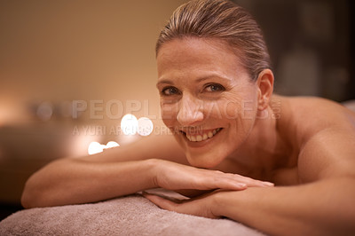 Buy stock photo Portrait, massage and relax with woman, smile and luxury with wellness and spa with skincare. Face, candles and mature person with peace and zen with treatment and vacation with self care and detox