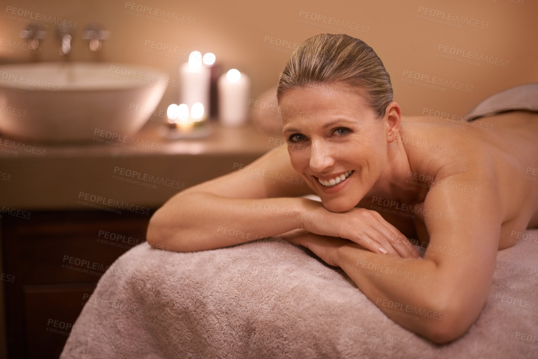 Buy stock photo Portrait, massage and relax with woman, peace and luxury with wellness and spa with skincare. Face, candles and mature person with health or zen with stress relief or vacation with self care or detox