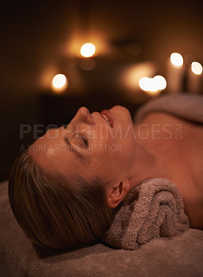 Buy stock photo Face massage, spa and wellness with woman, luxury and candle with hospitality and peace. Person, facial and girl with stress relief or healthy with vacation or beauty with holiday, detox or self care