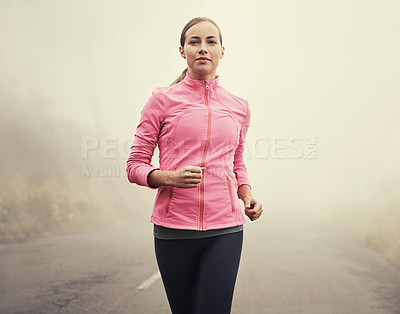 Buy stock photo Nature, fitness and portrait of woman running on mountain road for race, marathon or competition training. Sports, exercise and female athlete with cardio workout in misty outdoor woods or forest.