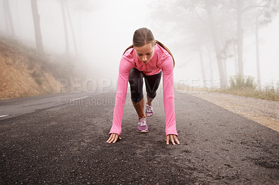 Buy stock photo Runner, start and woman on path outdoor in forest, park or woods for exercise in winter. Morning, fog and person with fitness challenge or prepare for workout on road in countryside with nature