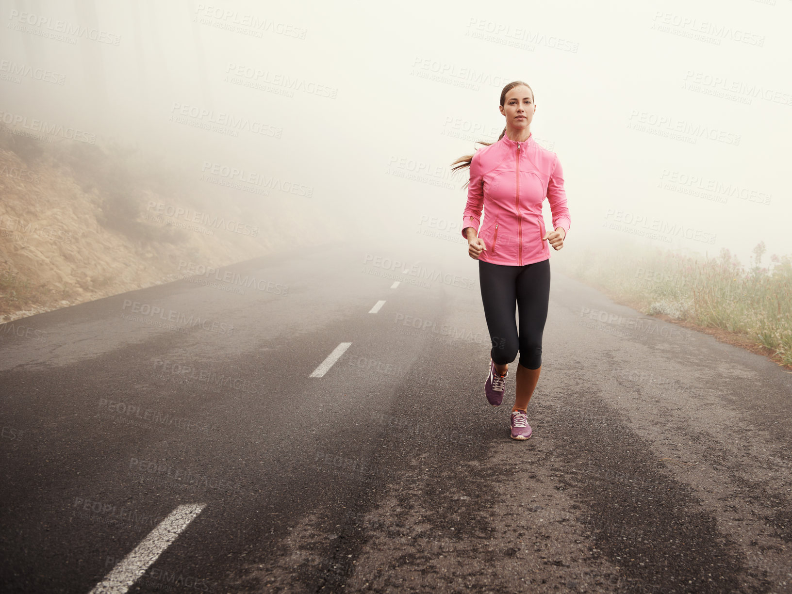 Buy stock photo Nature, sports and young woman running on mountain road for race, marathon or competition training. Fitness, exercise and energy with female athlete with cardio workout in outdoor, fog and health