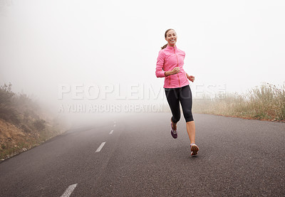 Buy stock photo Nature, sports and portrait of woman running on mountain road for race, marathon or competition training. Fitness, exercise and female athlete with cardio workout in misty outdoor woods or forest.