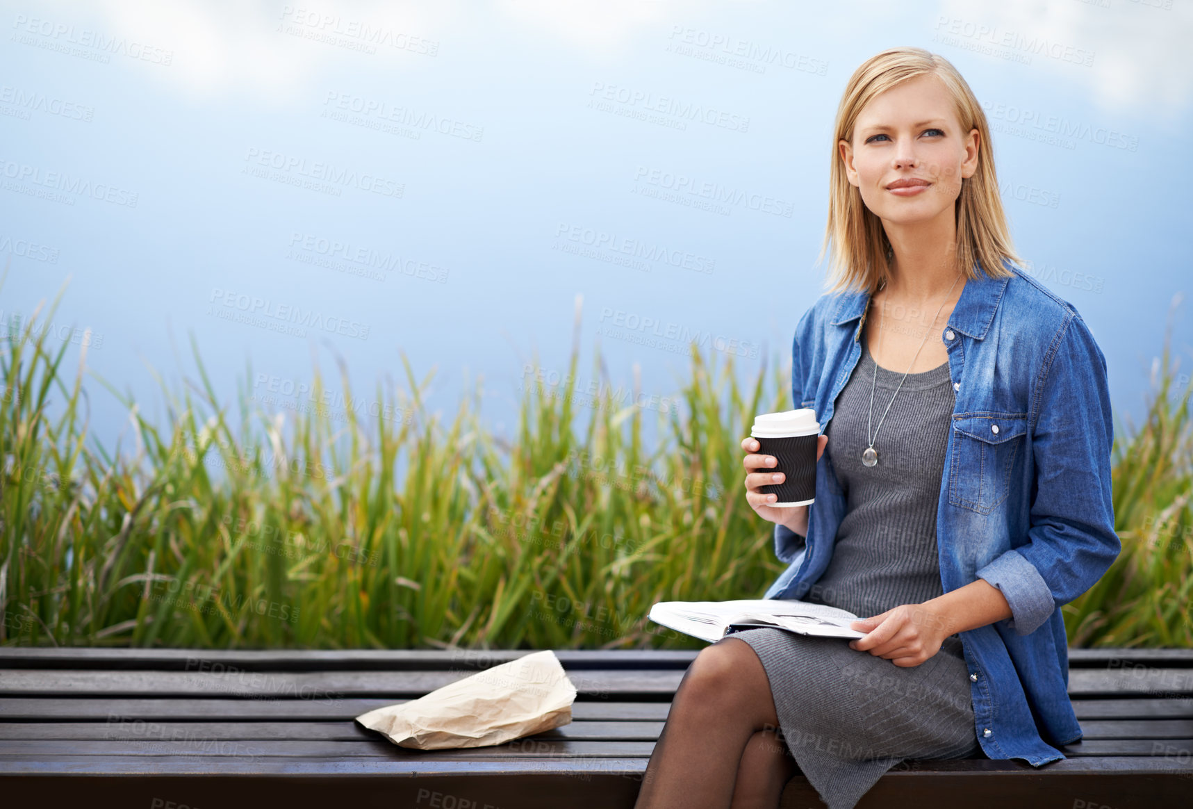 Buy stock photo Coffee, park and woman on bench thinking with books for lunch break, relax and calm in nature. Contemplating, reading and person outdoors with caffeine drink, beverage and tea by lake on weekend