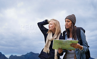 Buy stock photo Woman, friends and thinking with map for lost direction, location or hiking adventure together in nature. Young female person, hiker or team with travel guide for destination, route or outdoor path