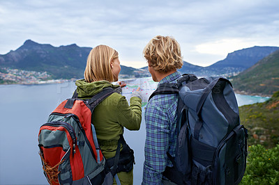 Buy stock photo Hiking, nature and couple on mountain with map and backpack for freedom, trekking and explore landscape. Travel, dating and man and woman by scenic view on holiday, vacation and outdoor adventure