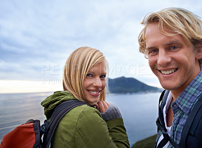 Buy stock photo Hiking, happy and portrait of couple on mountain with backpack for love, trekking and explore landscape. Travel, nature and man and woman by scenic view on holiday, vacation and outdoor adventure