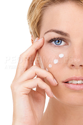 Buy stock photo Face cream, beauty and portrait of woman for skincare, wellness and facial care on white background. Dermatology, salon and closeup of person for moisturizer, lotion or anti aging cosmetics in studio