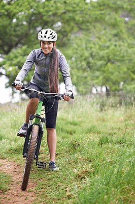 Buy stock photo Happy woman, portrait and cyclist with bicycle in nature for off road travel, trail or extreme outdoor sports. Female person, rider or biker with smile in forest for fitness, workout or exercise
