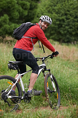 Buy stock photo Portrait, bike and man cycling in countryside for adventure, discovery or off road sports hobby. Fitness, health and wellness with young cyclist on bicycle in nature for cardio training or exercise