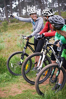Buy stock photo Friends, cyclist and forest on bike with smile for bonding, exercise and health with adventure in Chicago. Fitness, trail and mountain with hobby for happiness in nature, trip and wellness for fun.