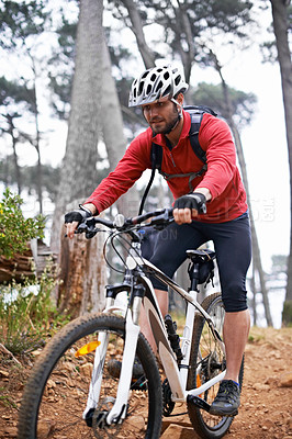 Buy stock photo Fitness, sports and man cycling in countryside for adventure, discovery or off road bike hobby. Exercise, health and trail with young cyclist on bicycle in nature for cardio training or workout